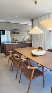 Sala de jantar integrada — foto real do apartamento decorado